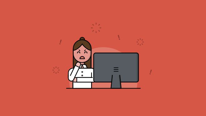 Cartoon of angry-looking woman sitting in front of a computer screen