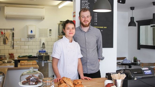 Robinsons cafe owners Will and Bex behind the counter