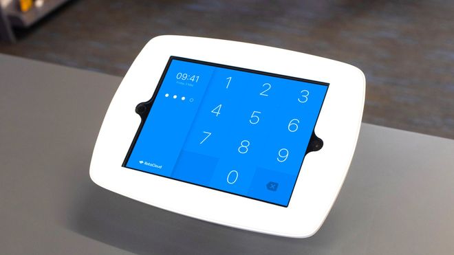 A clocking in terminal running RotaCloud Time & Attendance software