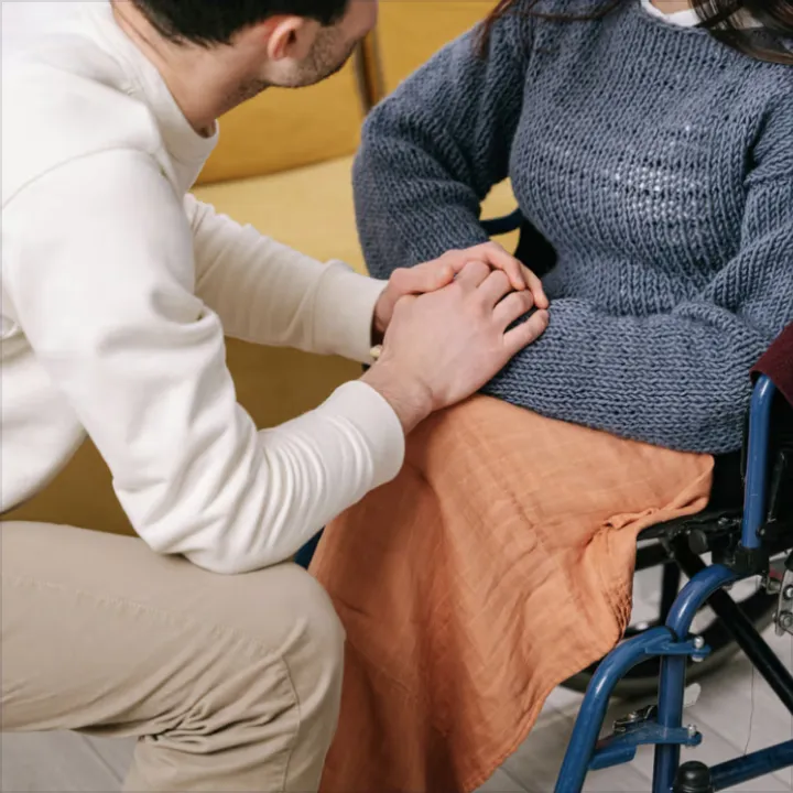 Comforting a person in a wheelchair