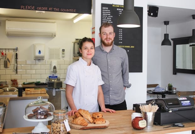 Robinsons cafe owners Will and Bex behind the counter