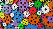 An array of brightly coloured interlocking cogs